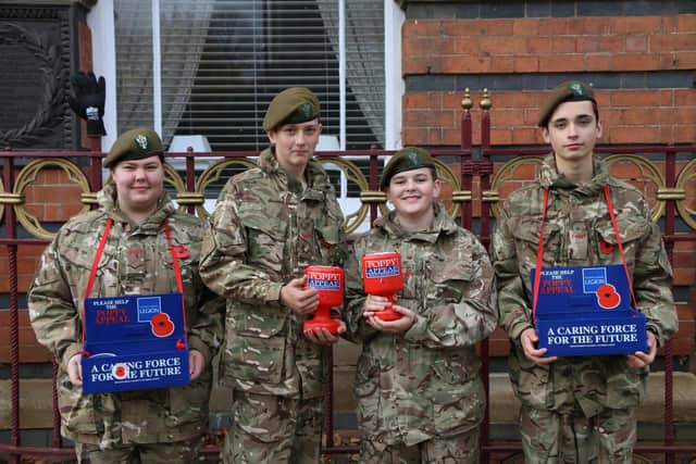Poppy-selling Derbyshire Army cadets helped a woman after she collapsed in Ilkeston town centre.