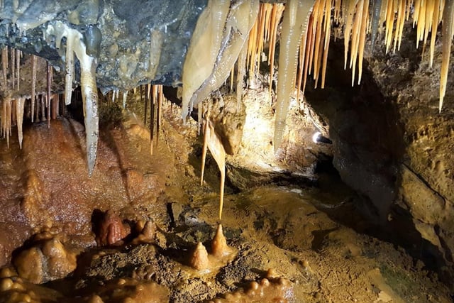 This, along with the nearby Blue John Cavern, is the only place in the world where Blue John is still mined and processed. It contains a stunning array of cave scenery, including a plethora of stalagmites and stalactites.