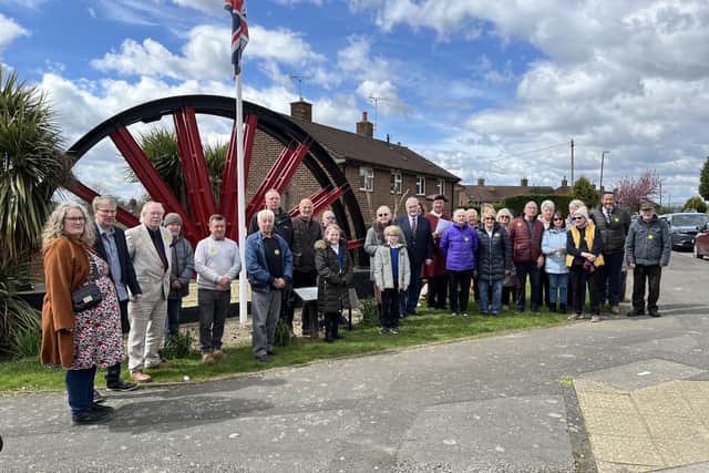 A plaque commemorating former Blackwell colliery workers who were killed on shift was unveiled at the villages pit-wheel monument.