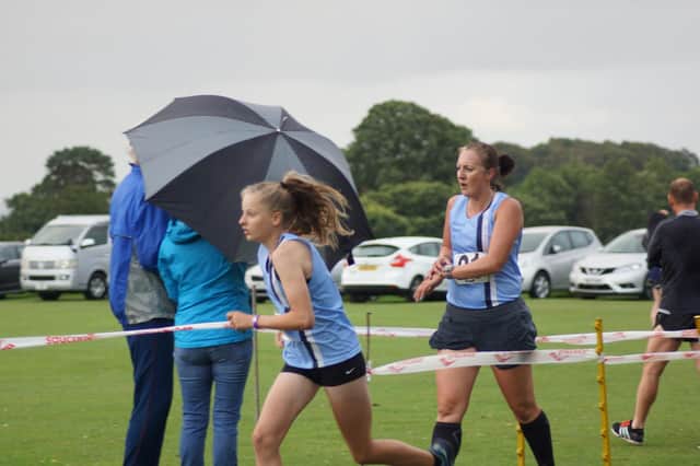Sophie Hopkinson and Alison Pye in a relay at Alport Heights in 2019.