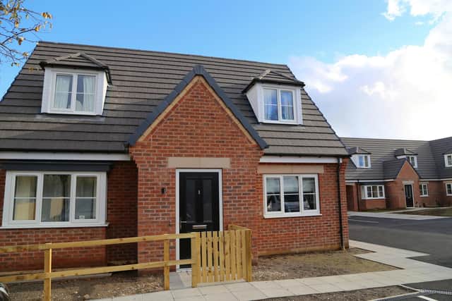 The new housing development is located at Harehill Mews in Grangewood and includes 12  modern and affordable two-bedroom houses bought by the Chesterfield Borough Council to support struggling families.