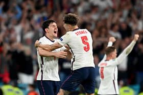 Maguire and Stones celebrate beating Denmark. Photo: Getty Images