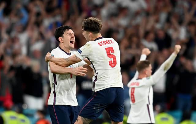 Maguire and Stones celebrate beating Denmark. Photo: Getty Images