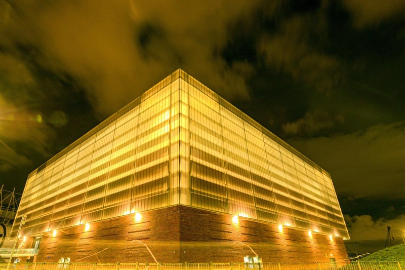 The sports, community and education facility founded by the Foundation of Light could be seen lighting up the night sky.