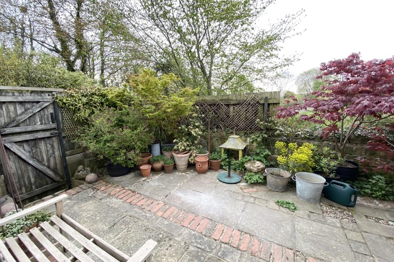 This tidy garden has a patio areas providing the ideal space to entertain guests..