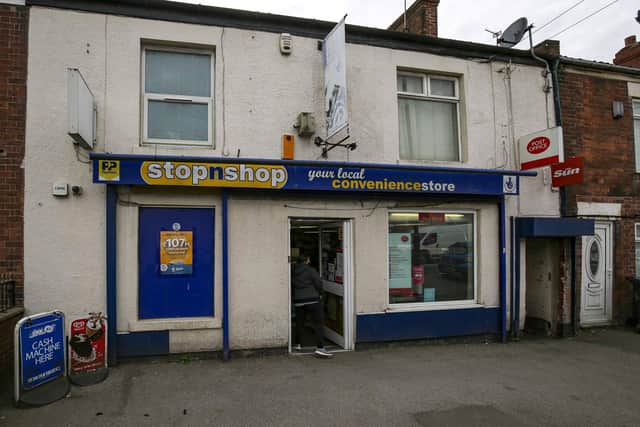 Witnesses say the boy's frantic parents had carried the lifeless tot into the StopnShop newsagents begging for help