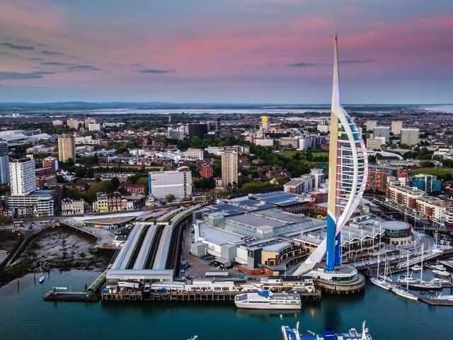 Spinnaker and the city at dusk