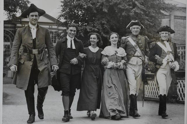 The Old Vic Festival At Buxton. Players enjoy a stroll in the gardens between rehearsals, of 'Devil's Disciples' in August 1939.