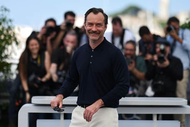 British actor Jude Law poses during a photocall for the film "Firebrand" at the 76th edition of the Cannes Film Festival in Cannes, southern France, on May 22, 2023. (Photo by Patricia DE MELO MOREIRA / AFP) (Photo by PATRICIA DE MELO MOREIRA/AFP via Getty Images)