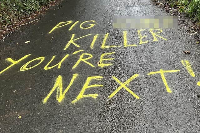 Police are investigating this threatening message which appeared on a road in Matlock this morning.
