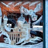 A Hogwarts Christmas window by @boardwritingbykim for Dan Ashcroft Design on Chatsworth Road.