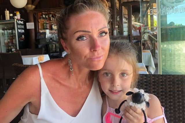 Amy Smith with daughter Isla on holiday two years ago.
