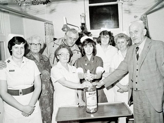 Heanor hospital charity bottle presentation, December, 1983.