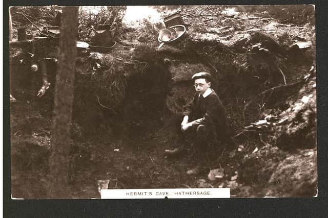 Postcard depicting the Hermit's Cave at Hathersage which was inhabited by a 17-year-old boy.