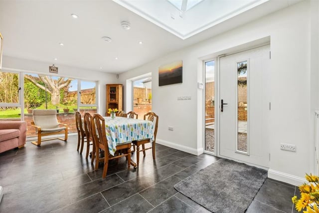 Take in the lovely views of the rear garden during mealtimes in this dining area which has a roof lantern that provides lots of natural light.