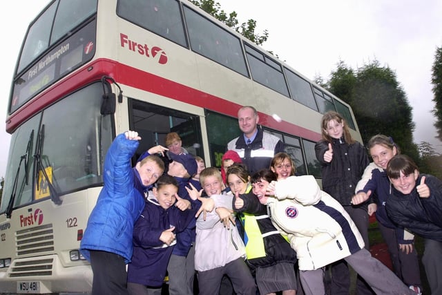 First mainline driver Neil Duggan is pictured with Edlington St Mary's Middle School pupils and teacher Annette Woodall