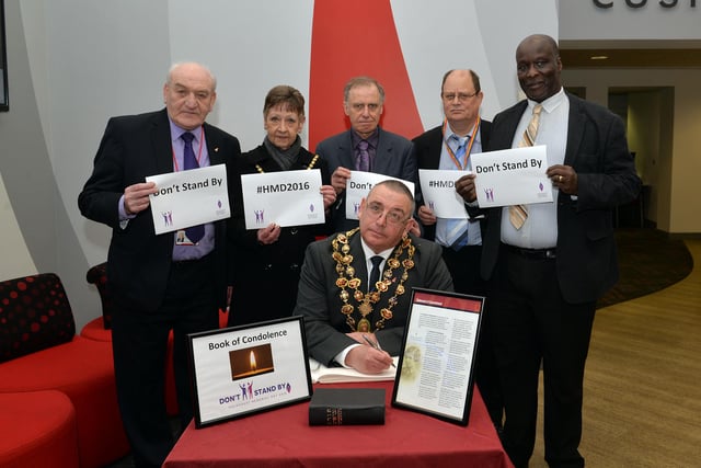 World Holocaust Day, Chesterfield Mayor Barry Bingham signed the Book of Remembrance with from left Coun John Burrows, Mayoress June Bingham, Coun Terry Gilby, Coun Keith Brown and Coun Alexis Diouf