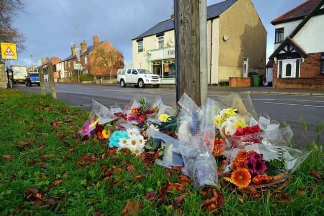 An inquest has been opened into the death of Peshang Sleman. Flowers at the scene of his death at Somercotes Hill, Somercotes.