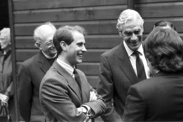 Prince Edward visits St Mary's cathedral workshop project in Edinburgh, October 1988. Other men not identified.