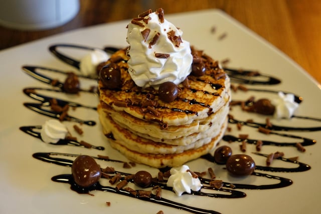 The cafe offers buttermilk pancake stacks including honeycomb chocolate, Greek yoghurt honey and blueberry, Kinder Bueno with white chocolate and whipped cream.