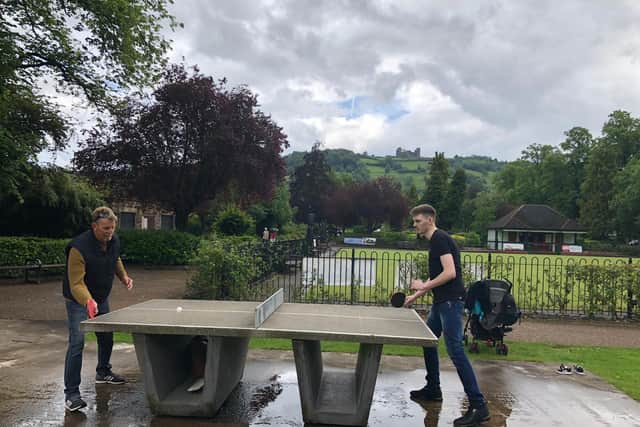 Tom (left) playing table tennis with his son Tom Junior at Matlock Park on Father's Day in 2019.