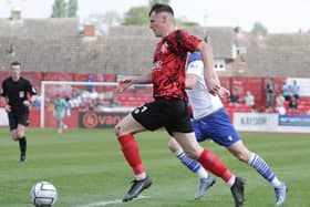 Bailey Hobson in action for Alfreton Town.