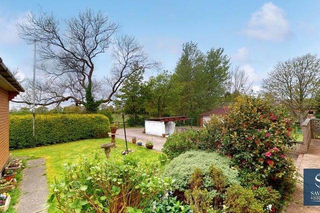 This view from the front door underlines the beauty of the garden at a property that is set well back from Nottingham Road on a plot of land stretching to 0.37 of an acre.