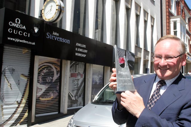 Jewellery business boss John Stevenson with an award in 2006.