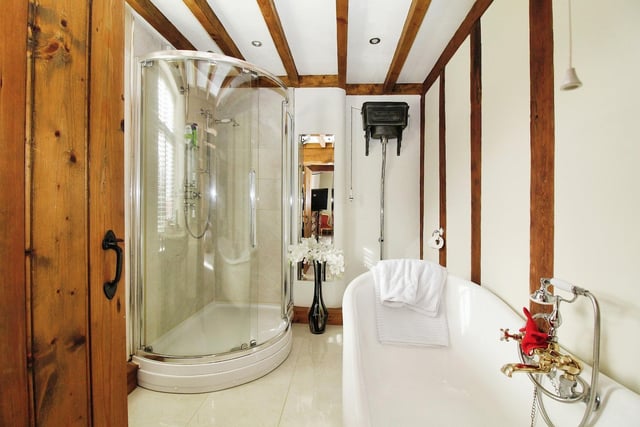 Marvel at the excellence of the en suite bathroom to the master bedroom. It comprises a roll-top, claw-foot bath with Victorian-style mixer tap attachment, high-flush WC, vanity wash hand basin and corner, tiled shower cubicle with shower.