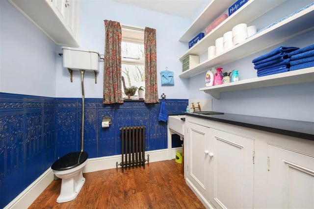 A utility room with wc