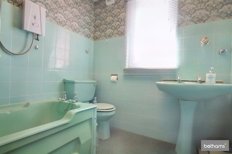 The family bathroom contains a  bath with shower over, a wash basin and wc.
