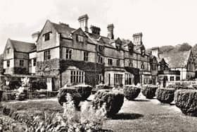 Derwent Hall in 1876 was a very modest stone gabled house dating from 1672, built for Henry Balguy, a lead trader, and lightly modernised by his son in 1692.The family sold up in 1767 to the Bennets, who were followed by the Reads and in 1846 by the Newdigates of West Hallam (qv) and Arbury. In 1876 it was bought by the Duke of Norfolk to bestow on his younger son Lord Edmund FitzAlanHoward, who appointed J. A. Hanson to enlarge the house considerably, in matching style, and add a chapel. Lord Edmund was appointed the last Viceroy of Ireland in 1921 and was in consequence created 1st Viscount FitzAlan of Derwent. Not long afterwards it was sold force majeur to the water authority for the building of a reservoir; the family left in 1932 and, after a decade as a youth hostel, it was finally vacated, stripped, dismantled and drowned in 1943 by the Derwent Reservoir. Elements rescued from it survive in the mayors’ parlours of Derby, Nottingham and Sheffield, co-sponsors of the destruction.