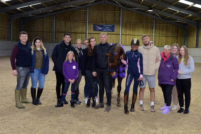 Family and friends of Gracie Spinks alongside the Bespoke Equine England team and the models for the Gracie Spinks Collection clothing photo shoot