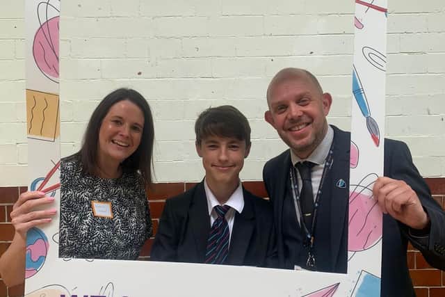 Lisa Stones, of Chesterfield-based Mortgage First, with The Bolsover School pupil Matt Alsop and teacher Richard Stacey