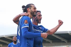 Will Grigg and Ollie Banks celebrate. Picture: Tina Jenner.