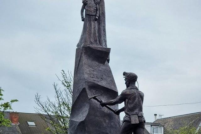 The statue is the work of sculptor, Peter Walker. It stands in the market place.