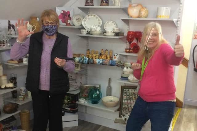 Pat and Margaret prepare to reopen Ashgate Hospicecare's charity shops and cafes next week.