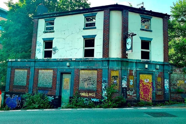 The windows of the former Durham Ox pub are boarded up