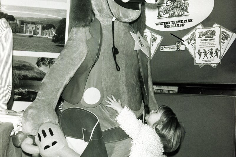 Young Laura Willis with new buddy Frontier Fred at the travel show in 1990