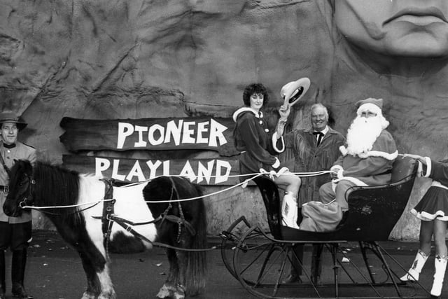 Santa arriving at Pioneer Playland, December 1990