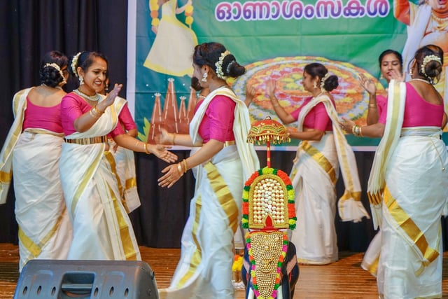 On the stage with traditional dance performances.