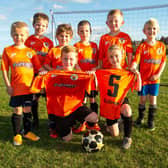Wingerworth’s youngsters show off their new kit.