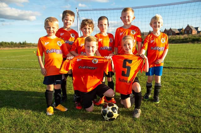 Wingerworth’s youngsters show off their new kit.