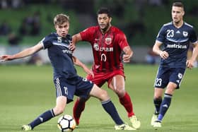 Cameron McGilp, pictured left playing for Melbourne Victory, is currently on trial with the Spireites from Swindon Town.