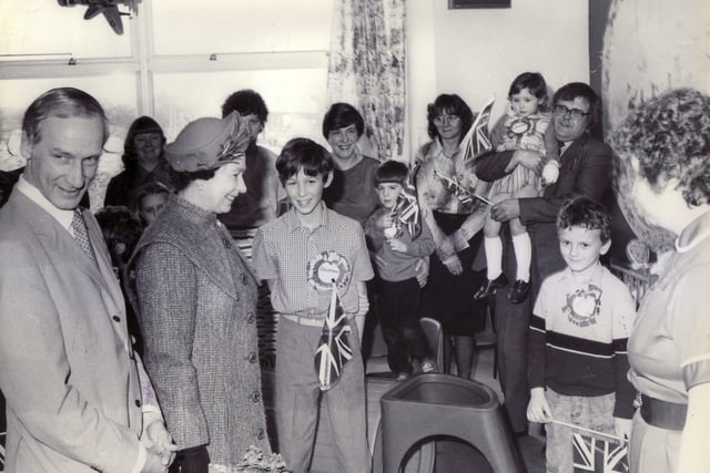 Children and parents meet the Queen on her visit to Derbyshire in 1985.