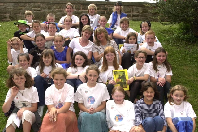 Who can you spot in this group photo of  Summer School presentations at Bradfield School, Worrall in August 200?. With the children are, Sue Parnall, centre left , summer School group organiser and Jane Powell Star holidays, right.