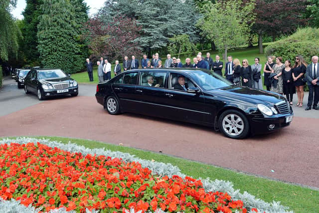 Ernie Moss' funeral cortege arrives at Chesterfield Crematorium.
