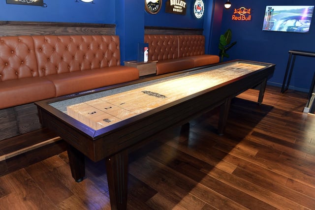 A shuffleboard table has been installed upstairs.
