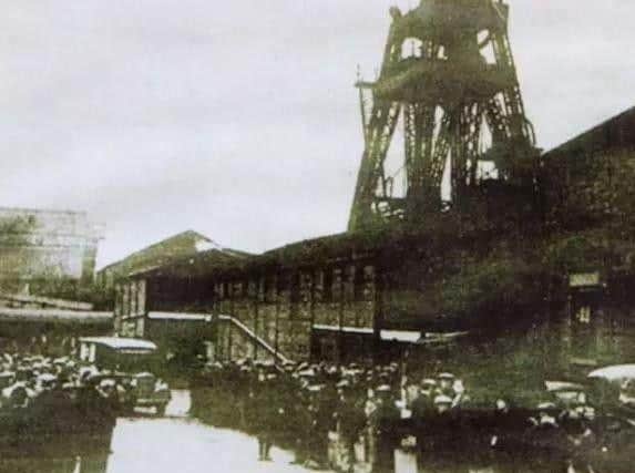 Rescuers and relatives on the colliery surface after the blast (photo: Sandra Struggles)