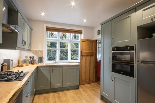 The kitchen was refitted in 2021 and boasts shaker style wall, drawer and base units with under unit lighting and solid wood work surfaces. Integrated appliances include a washing machine, slimline dishwasher, electric double oven and four-ring gas hob with glass splashback.